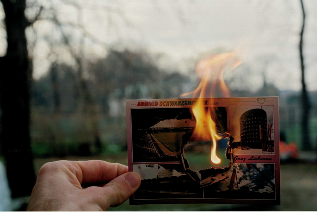 About the Artwork Jonathan Monk. the Arnold Schwarzenegger Stadion on Fire. 2003c Print. 15 X 22,5 Cm  by Jonathan Monk